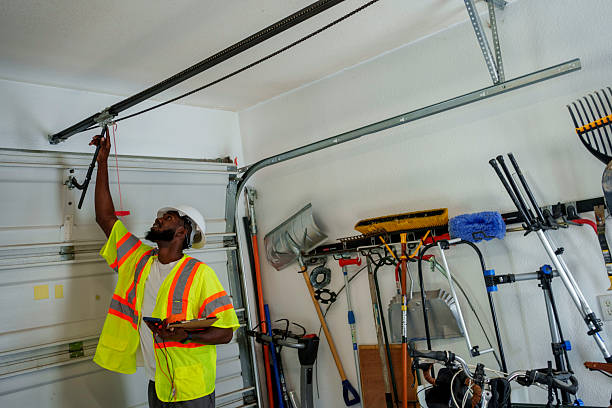 Professional Garage Door Installation technician working in Guntersville, AL